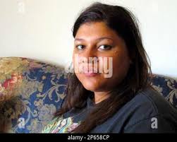 April Carrillo, 22, seated in her Moorhead, Minn. apartment