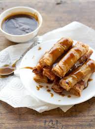 17 street food dishes to try in the philippines. Banana Lumpia With Caramel Sauce Recipe Pinch Of Yum