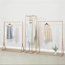 Black And Gold Clothes Rail Retail Store Furniture Gold Metal Clothing Display Racks For Garment Clothing Rack Display Store Design Boutique Clothing Displays