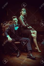 Women entered the workforce in large numbers during world war i, and the return to peacetime in the 1920s didn't slow the growth of women's employment. Handsome Man And Beautiful Young Woman In The Style Of The 1920s Fashion Clothes Make Up And Hair In Luxurious Retro Style Stock Photo Picture And Royalty Free Image Image 142817459