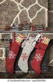 For stuffing ideas for the entire family, here. Christmas Stockings Stuffed Stockings Hanging On A Fireplace On Christmas Morning Canstock