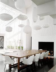 It is the one place everyone can come together at one time. Herringbone Fireplace Modern Dining Room Douglas Friedman