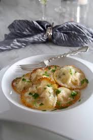 What is a good sauce for lobster ravioli. Lobster Ravioli Lemon Butter Limoncello Cream Sauce Delicious Table