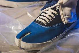 Founded by the unconventional martin margiela, maison margiela is a pioneering label in deconstructionist design. Highlights Maison Margiela Tabi Lace Up Sneakers Hbx Journal
