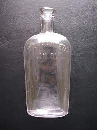 Metal plugs were added in the corner peaks of the roof in the mold to achieve this. Union Oval Clear Glass Whiskey Bottle Flask Antique Vintage Bottle Antique Glass Bottles Old Bottles