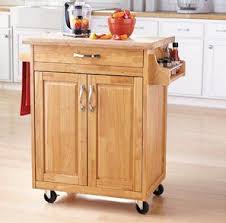 .mainstays storage cabinet comes with two adjustable shelves and one fixed shelf spacious ample storage for kitchen accessories and pantry items behind four doors also expands household storage. Mainstays Kitchen Island Cart Natural This Stylish Kitchen Furniture Has A Solid Wood Top Portable Kitchen Island Kitchen Cart With Drawers Portable Kitchen
