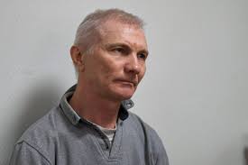 Russia convicts father of teen who drew antiwar picture