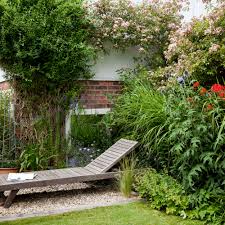 A laurel hedge reduction in a uk cottage garden. Cottage Garden Ideas Create A Charming Country Style Garden In Any Setting