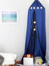 Locate a camping website that features a sequence of adjacent trees. How To Make A Diy Kids Play Canopy Hgtv