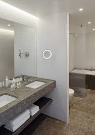 Jonas Lindvall Transforms Former Office Block Into Hotel In 2020 Bathroom Interior Design Bathroom Interior Hotel Interiors