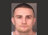 Police: Kan. suspect still at large after stolen car struck a tree