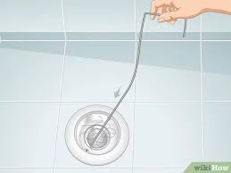 to clean hair out of a shower drain