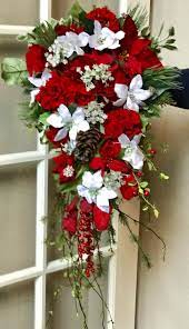 Buy the burgundy poinsettia bush by ashland® at michaels.com. Aiyanna S Bouquet With Her Velvet White Poinsettias Christmas Wedding Table Wedding Themes Winter Winter Wedding Bouquet