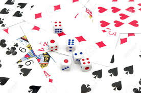 A dice game and social activity for large groups. Playing Cards And Dice Stock Photo Picture And Royalty Free Image Image 14649891