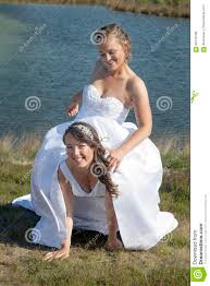 Just Married Happy Lesbian Couple in White Dress Has Fun Near Sm Stock  Image - Image of love, homosexual: 90153195