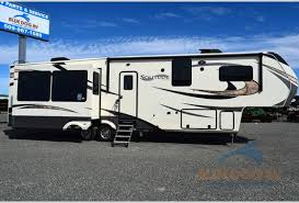 Grand design is dedicated to offering you the highest quality campers with more features, excellent designs and more. Grand Design Solitude Fifth Wheels Refined Residential Elegance Blue Dog Rv