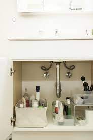 Bathroom cabinet organization sink organizer kitchen storage cabinet organizers under sink organization kitchen organisation hacks home this is what the cabinet under my sink looked like. 5 Tips For Under The Sink Organization Remodelista Bathroom Sink Organization Small Bathroom Sinks Bathroom Sink Diy