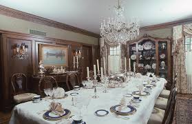 Large dining area featuring a classy dining table and chairs set on top of an area rug. 1996 Formal Dining Room Friends Of The Mansion