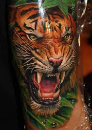 Black and grey 3d jesus with saint mary tattoo on man chest. Amazing Colorful Roaring Lion Tattoo Design