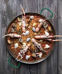 Adding a few touches of spanish décor brings authenticity and spice to any tapas party. What Is Paella Exploring A Spanish Art
