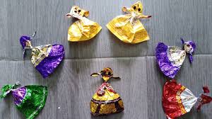 Do you have some surplus candy wrappers, too? Make Beautiful Dancing Dolls With Chocolate Wrappers Youtube