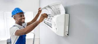 Black Man Fixing Air Conditioner Stock Photos - Free & Royalty-Free Stock  Photos from Dreamstime