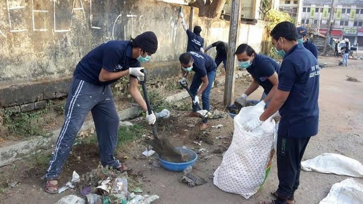 Cleanup event along a riverbank