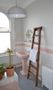 Pink plumbing fixtures plus black & white damask vintage bathroom decor (1960). Spectacularly Pink Bathrooms That Bring Retro Style Back