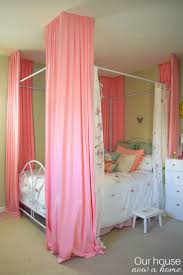 Allow the curtains to drape easily to the floor for a romantic look. Girl Canopy Bed With Diy Floor To Ceiling Bed Curtains Our House Now A Home
