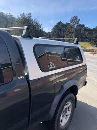 Custom built truck bed micro camper that fits toyota tacoma. Buying A Used Camper Shell Tips And Compatibility Info Axleaddict