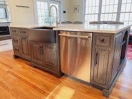 An island sink should either be accompanied by an island dishwasher or placed in close proximity to a dishwasher against the wall. Where To Place Your Kitchen Sink Dean Cabinetry
