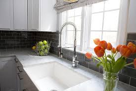 Throughout a weekend or two, you can make a chic and practical backsplash out of the subway. Gray Kitchen Subway Tiles With White Cabinets Contemporary Kitchen