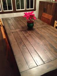 Our selection of entertainment centers will provide a place for your television and stereo system. Simple Decorative Unfinished Hardwood Dining Table And Chairs Added Pink Floral Centerpie Farmhouse Kitchen Table Sets Wood Dining Table Rustic Diy Dining Room