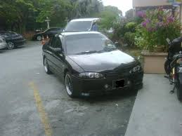 The plat number fitted at the side of the bumper just like mitsubishi evo plat number location. Wira Gagak Hitam Wira Extreme