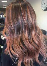 Rose gold hair is a pastel shade that looks amazing on every skin tone and hair color. 52 Charming Rose Gold Hair Colors How To Get Rose Gold Hair Rose Gold Hair Brunette Brunette Hair Color Strawberry Blonde Hair