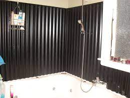 Corrugated Iron For Bathroom Wall So Easy To Clean And Looks Great Corrugated Metal Bathroom Metal Bathroom Walls Rustic Bathrooms