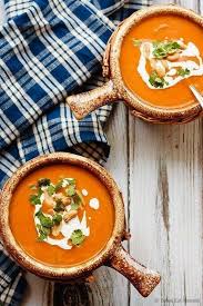 This Easy To Make Slow Cooker Thai Pumpkin Soup Is A Bit Spicy A Bit Creamy And Absolutely Amazing Thai Pumpkin Soup Pumpkin Soup Recipe Pumpkin Soup Easy