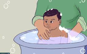 Kelly … washing her dress in the bathroom. Transitioning Your Child From A Baby Bath Tub