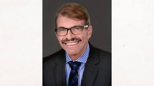 Bruce W. Austin, BDSC, FRACDS, MDSC, an Oral and Maxillofacial Surgeon with  Vintage Surgical Specialists