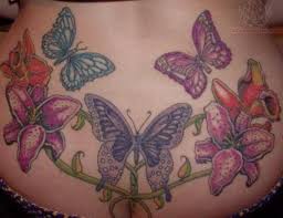 Butterflies And Flowers Lower Back Tattoo Design Back Tattoo Lower Back Tattoos Back Tattoos