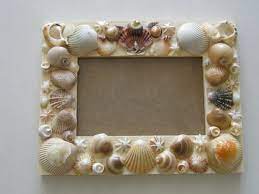 Cornici Foto Fai Da Te E Un Idea Con Una Di Legno Decorata Con Conchiglie Idee Fai Da Te Decorazioni Estive Fai Da Te Cornici Fai Da Te