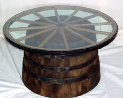 Barrel Table Use A Ships Wheel Instead Of Wagon Wheel Barrel Table Decor Barrel Furniture