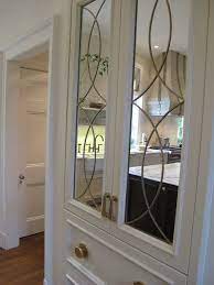 This works just as well in the bathroom as in any other room. Design Indulgence The Show House Mirrored Kitchen Cabinet Mirrored Cabinet Doors Glass Kitchen Cabinet Doors