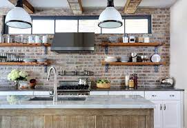 With a proper protective coating, a kitchen with gray cabinets can also be easily cleaned. Kitchen With Exposed Brick Transitional Kitchen Normandy Remodeling