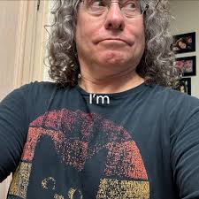 Who sang pencil neck geek? Also Who sang my name is Larry? Help!