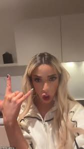 GK Barry hints that she has secretly married footballer Ella Rutherford  after just two months of dating as she refers to herself as a 'WAG'