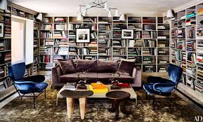 Adventures in building a pallet coffee table/bookshelves as a christmas gift for my daughter begins here: The Art Hanging Trend That S Reinventing Bookcases Architectural Digest