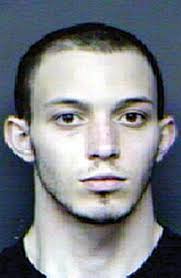 Man arrested for threatening another with rifle at school