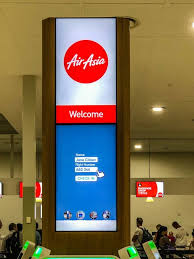 Looking For The Best Low Cost Airlines In Asia Check Out My Airasia Review Low Cost Airlines Economy Seats Signage