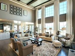 Two Story Family Room Two Story Family Room Curtains Stunning Co Home Design 2 S Living Room Furniture Arrangement Family Living Rooms High Ceiling Living Room